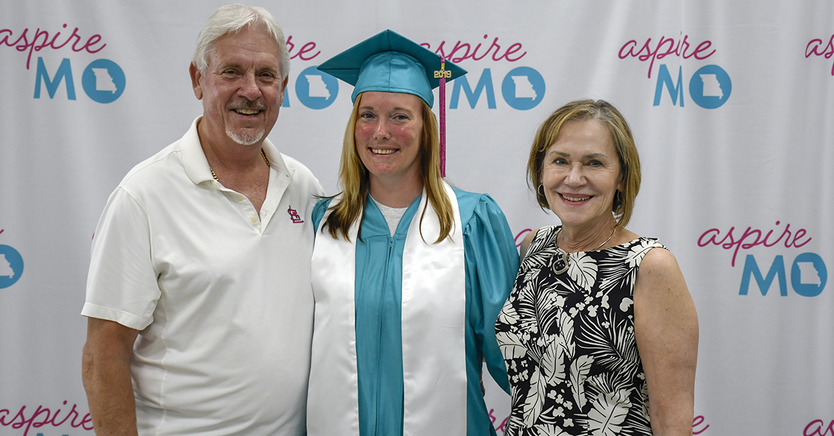 Lauren Avery and her parents pose for the cameras just after graduation. Ann and John Avery enjoyed seeing their daughter’s hard work pay off in confidence for her future.