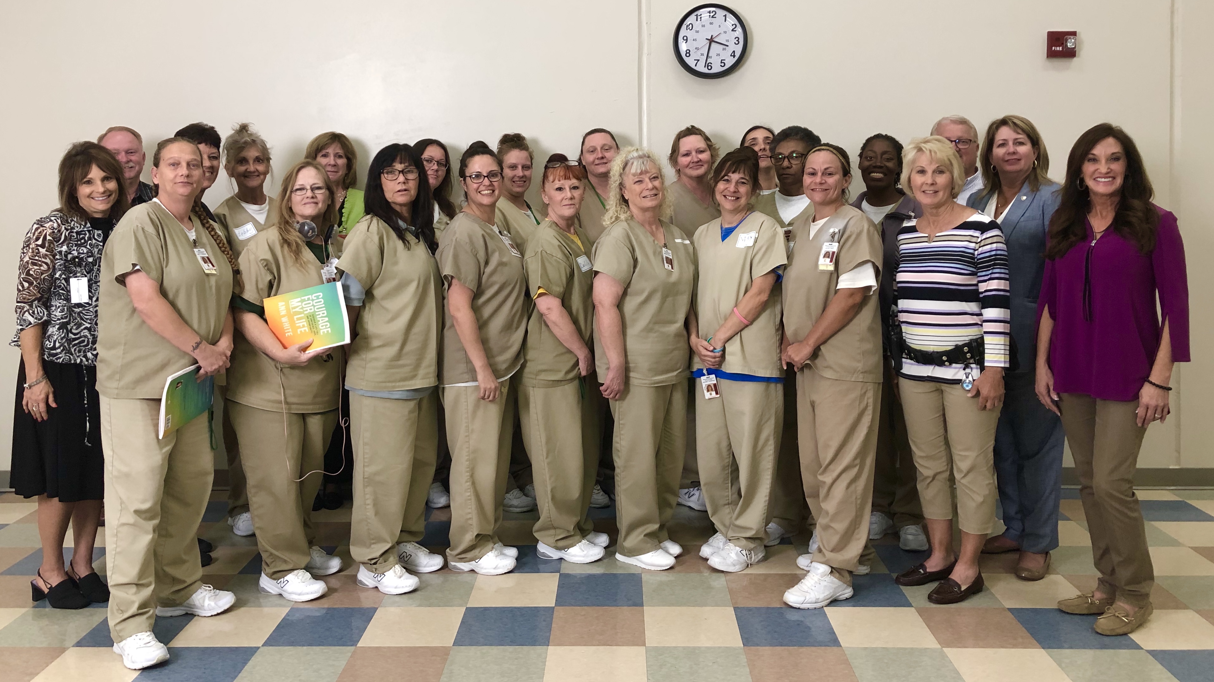 Motivational speaker Ann White with a group  of women and staff at Chillicothe Correctional Center
