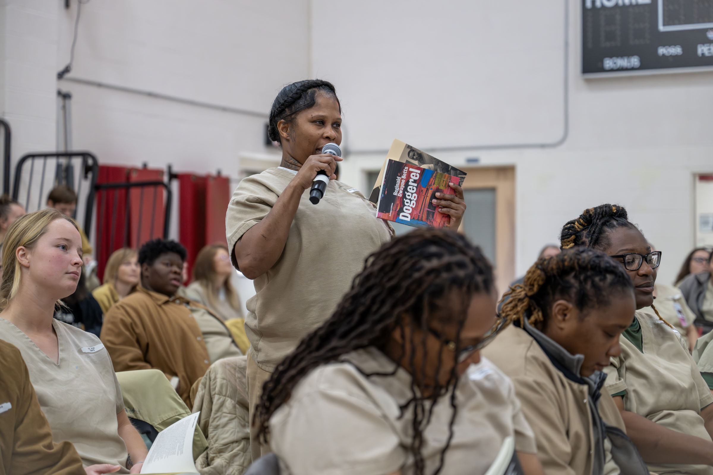 A WERDCC resident poses a question during a book talk with writer Reginald Dwayne Betts.