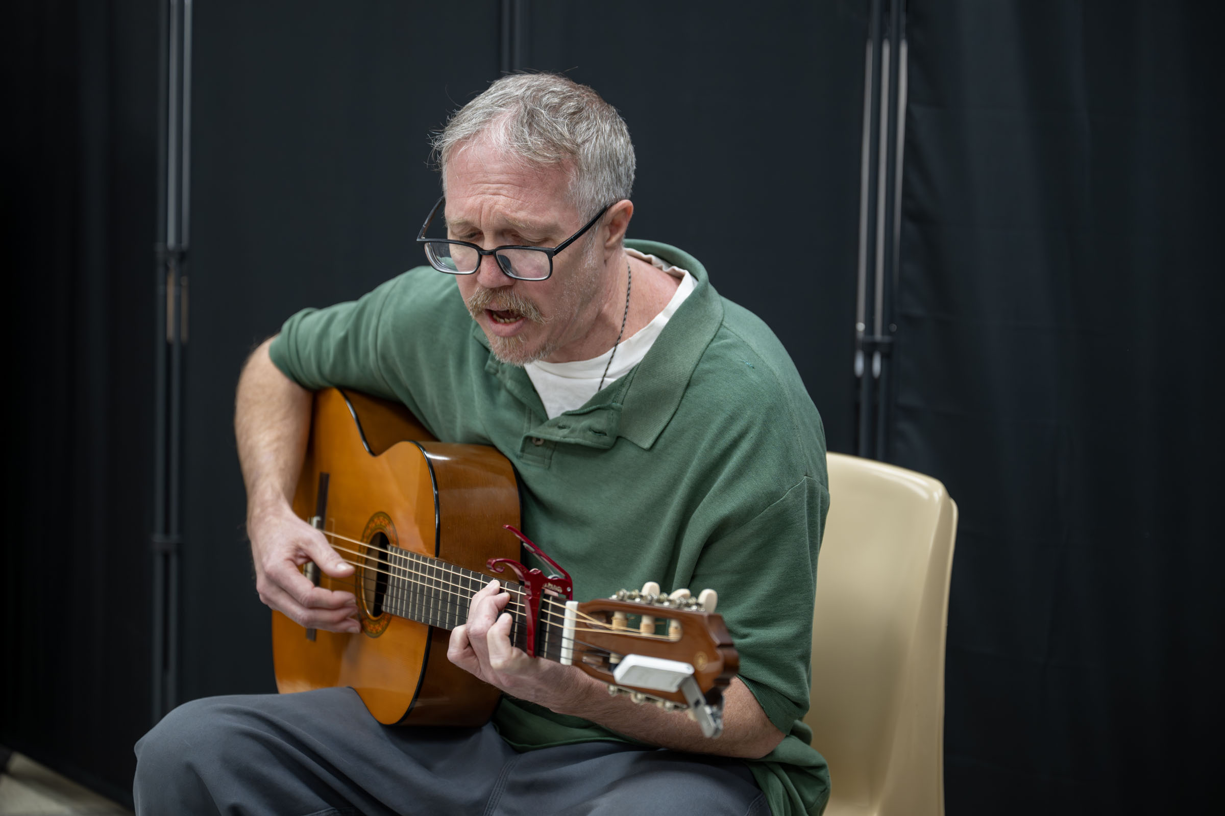 Jeremiah plays guitar and sings