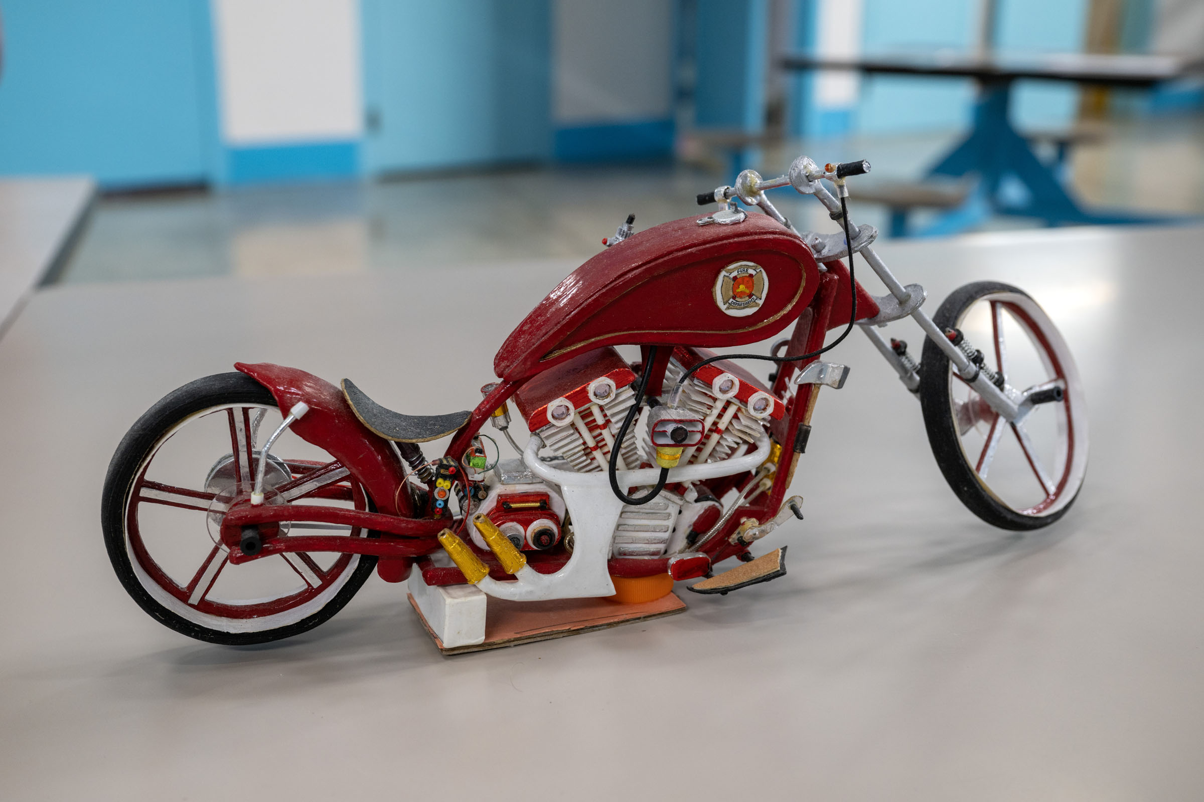 Bright red custom Harley-Davidson model honoring firefighters