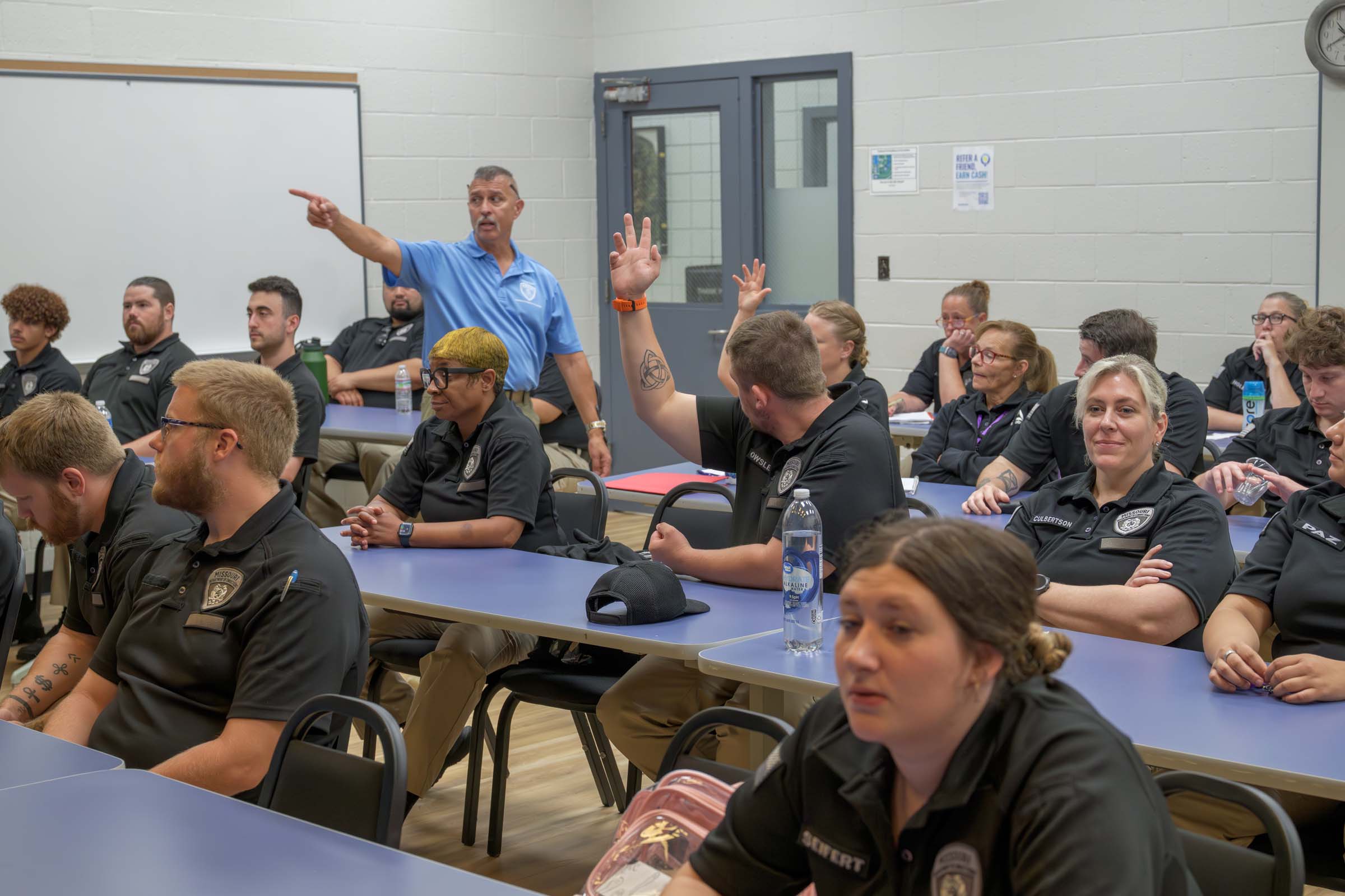 John Huber lectures to a class full of cadets
