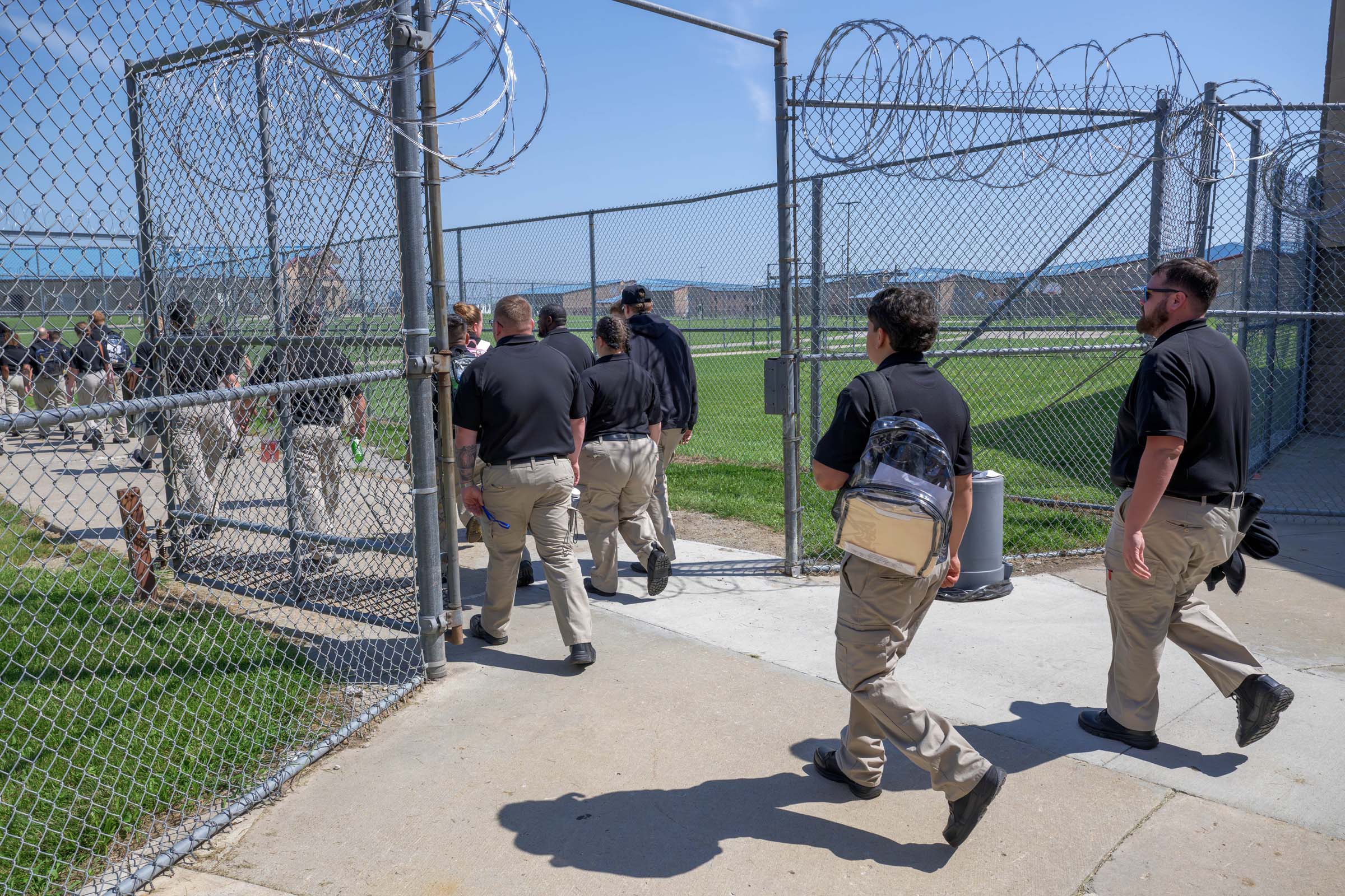 Cadets walk into the yard of the AEC.