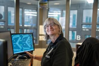 Officer in housing unit control center at Northeast Correctional Center