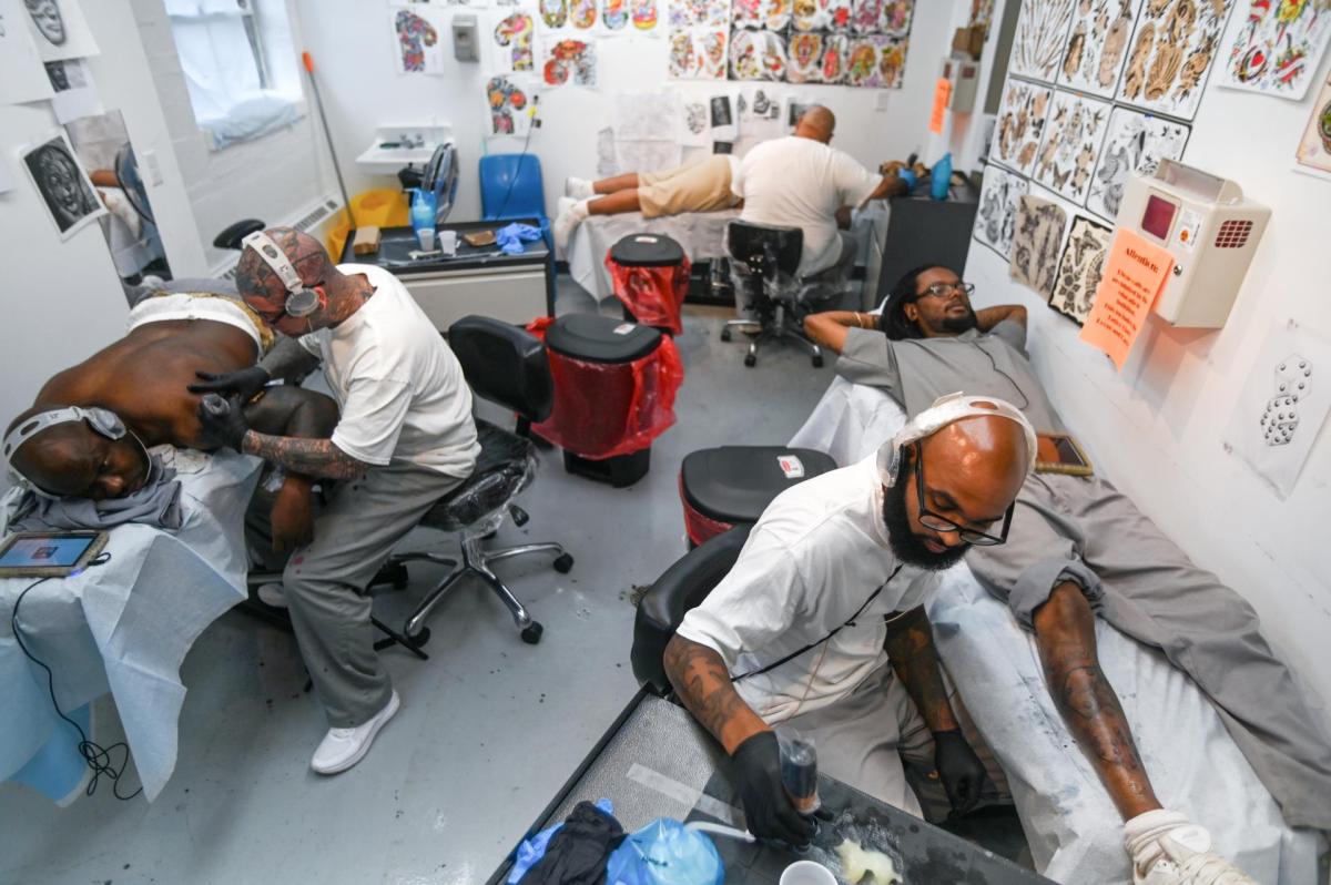 Residents in the tattoo apprenticeship program practice their skills at Western Reception, Diagnostic & Correctional Center.