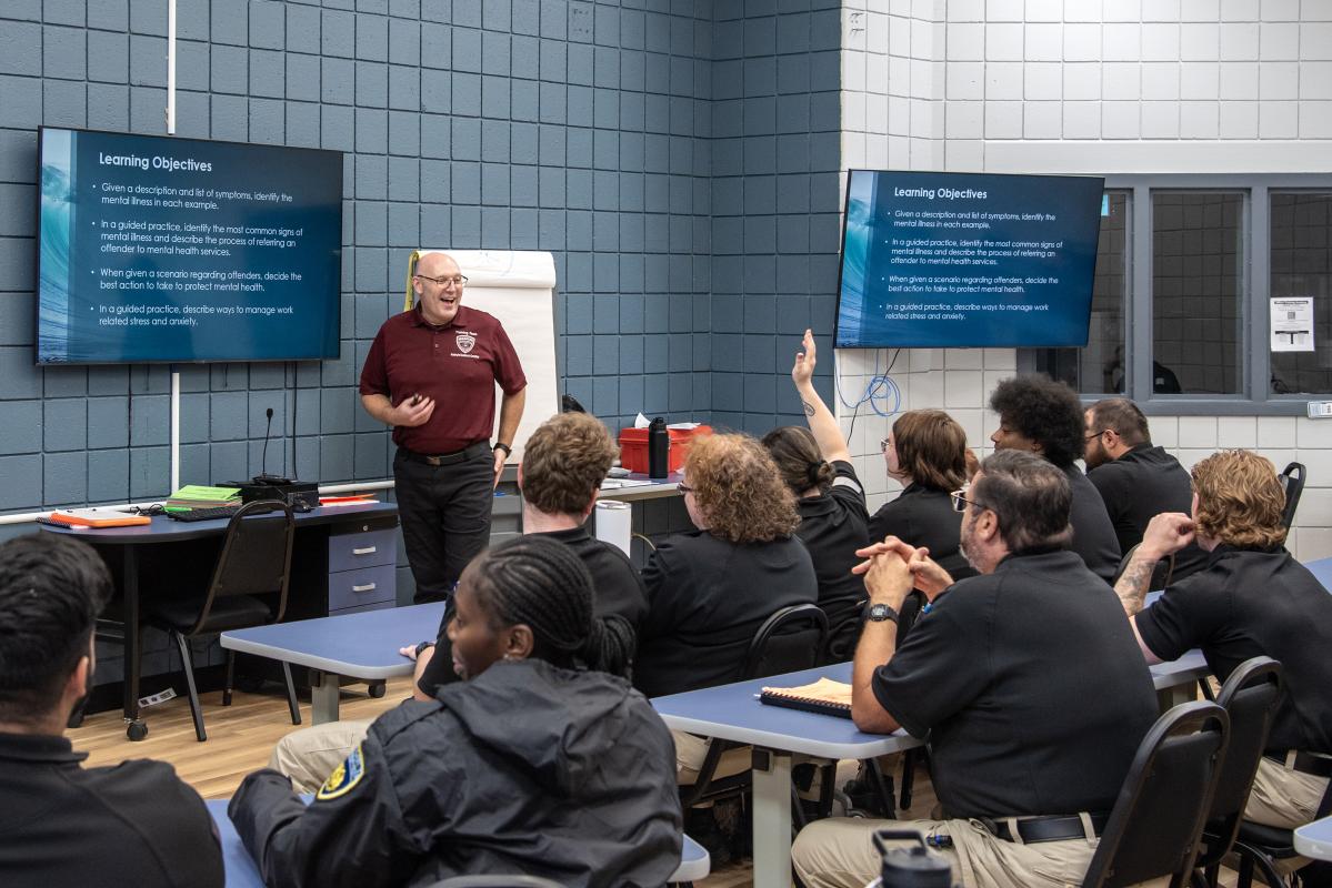 Training Tech Ryan Brownlow teaches a class in the newly remodeled Academy for Excellence in Corrections.