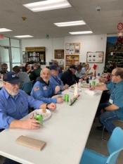 MTC staff, holiday meal, awards presentation