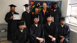 BCC Graduates and John Rorah Teacher.