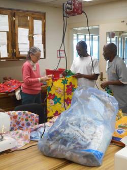 PIC Cynthia Hitschler teaches sewing to offenders at MECC
