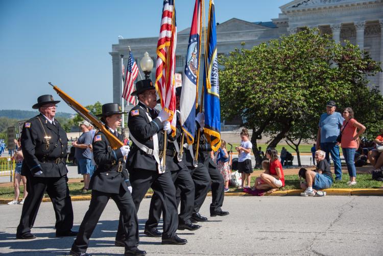 Honor Guard marching in front of the Capitol