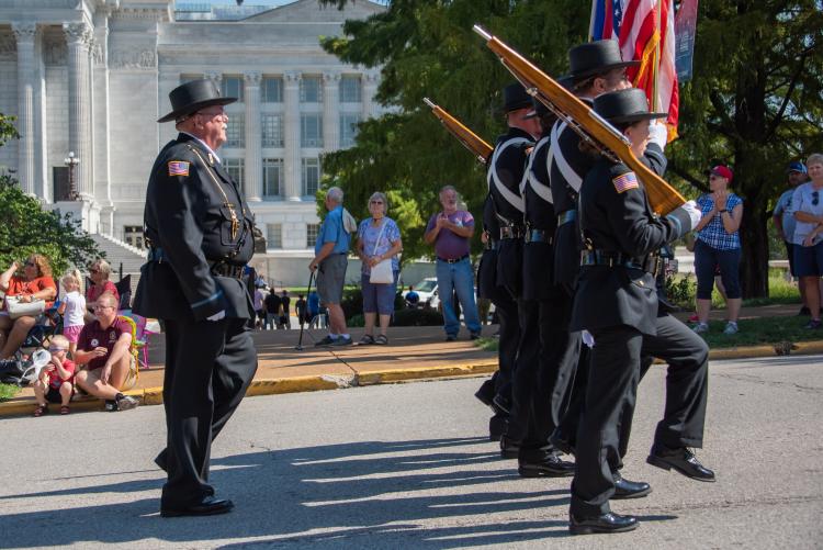 Honor Guard marching in front of the Capitol