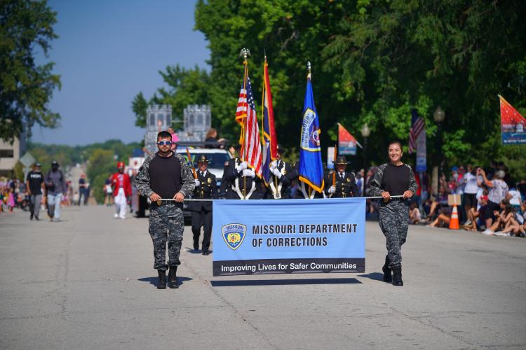 Group marching in parade