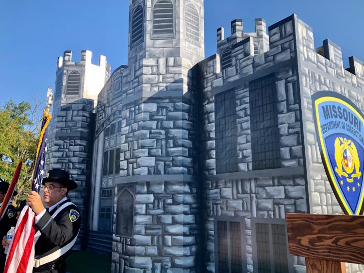 Honor Guard member in front of float