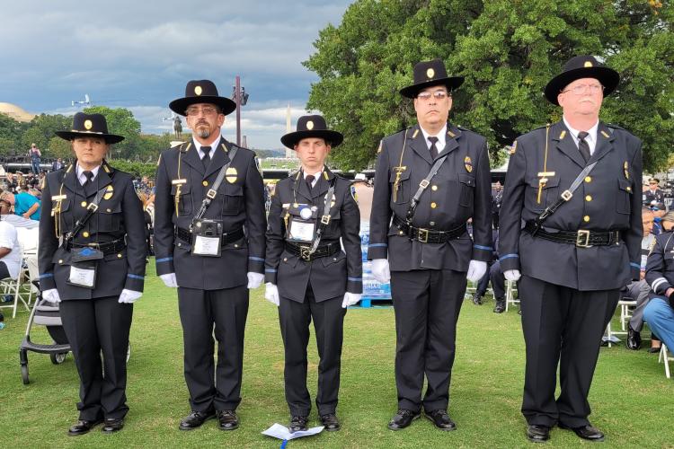 Honor Guard marching in front of the Washington Monument