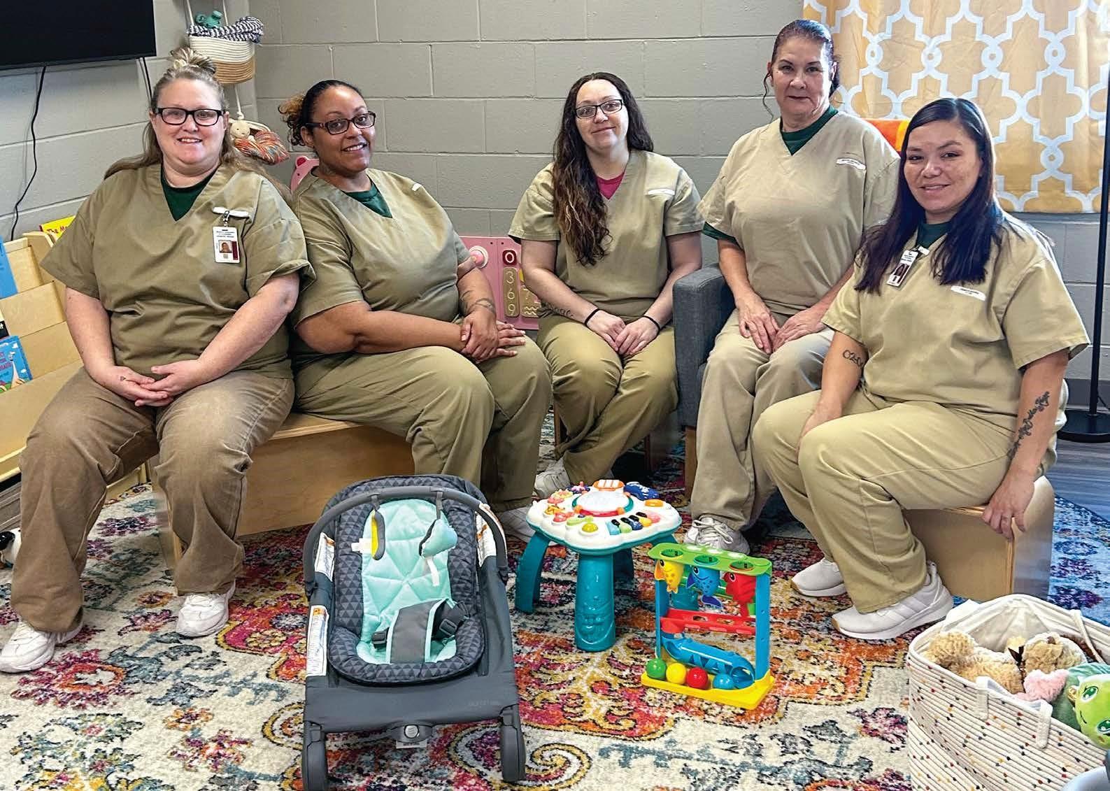 Five incarcerated women serve as caregivers supporting new moms and babies in the nursery wing at Women's Eastern Reception, Diagnostic & Correcitonal Center
