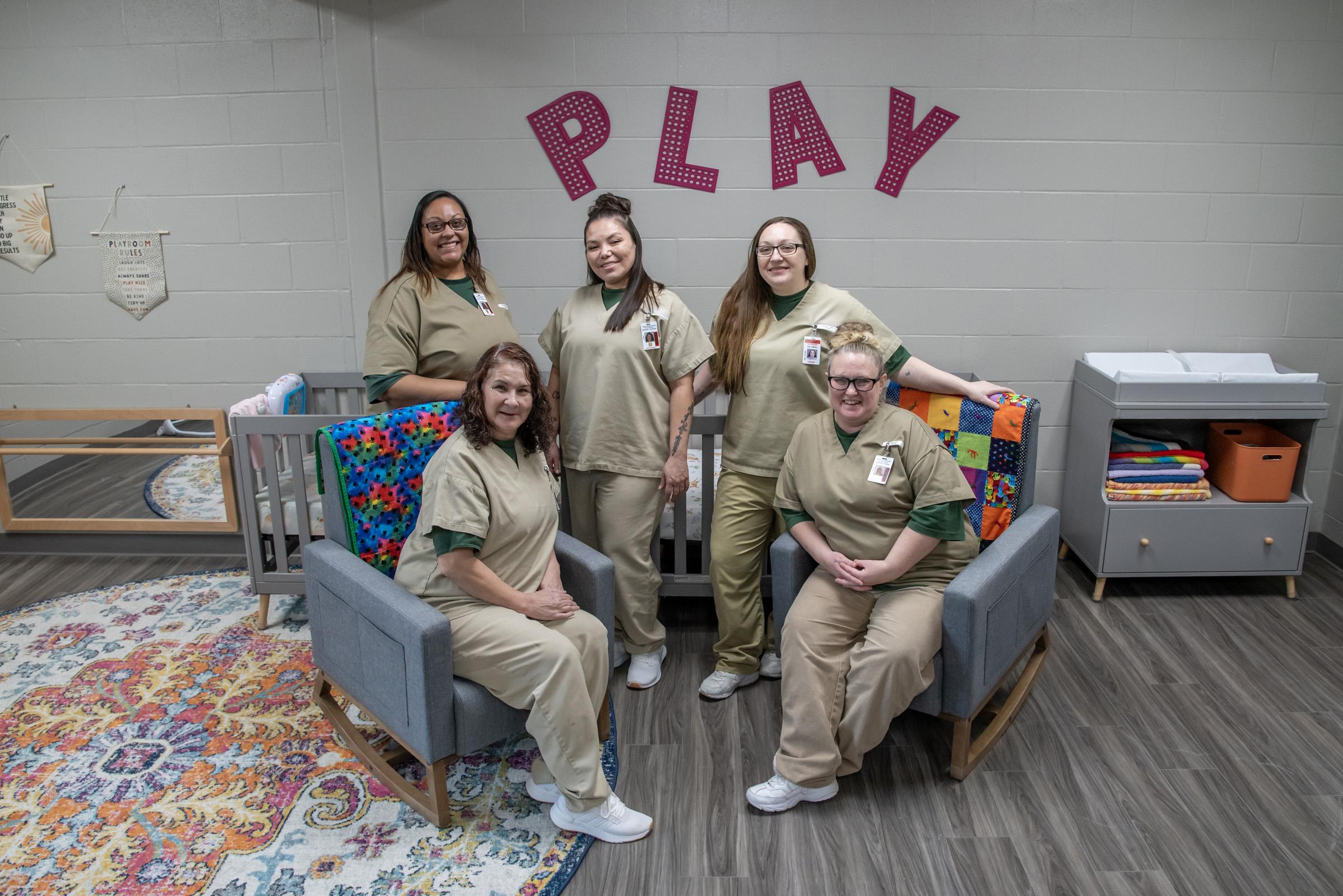 Prison Nursery Program caregivers, incarcerated residents of the Vandalia prison, help support moms and babies, providing childcare, respite and advice.