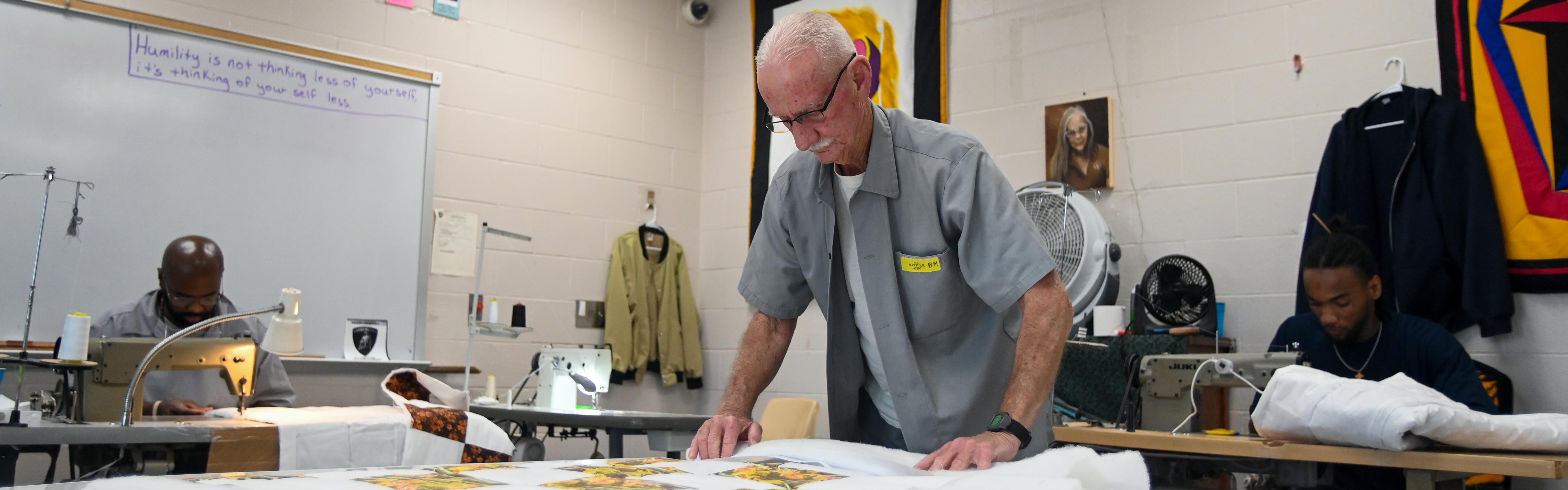 Quilters work in the Restorative Justice Program sewing room at Jefferson City Correctional Center