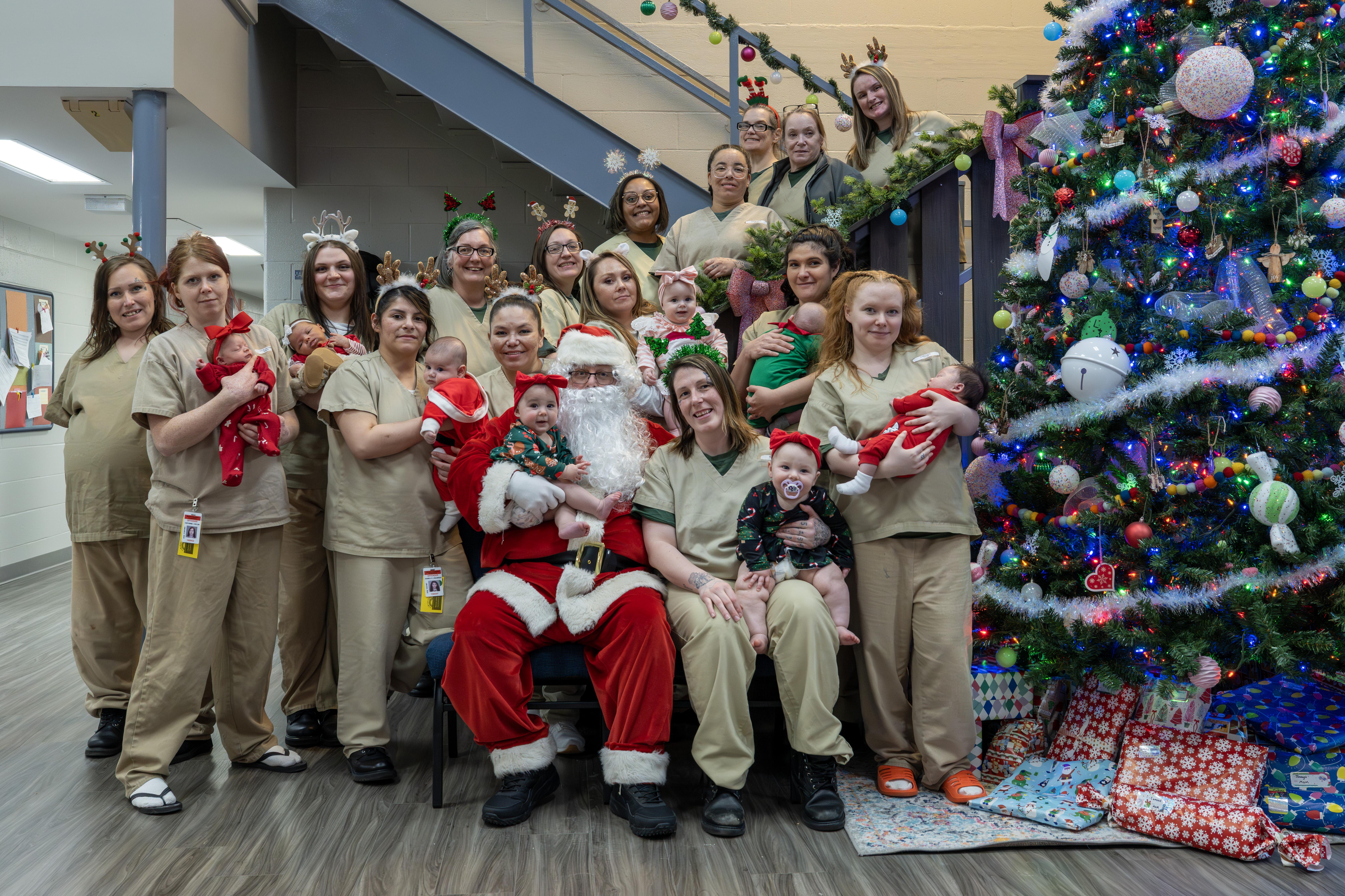 Moms, babies and caregivers in the Missouri Prison Nursery Program celebate the season with special guest Santa Claus.