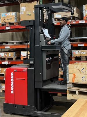 Man driving a forklift