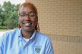 Young African-American woman in uniform.