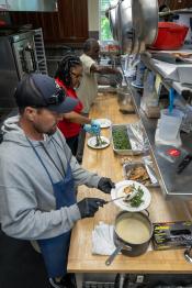 Chefs prepare lunch in the kitchen