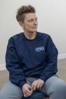 Steph Tandarich listens to a colleague during the PCIS process